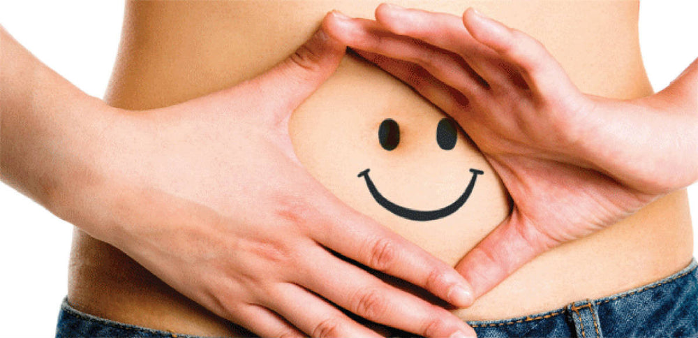a woman's stomach with a happy face