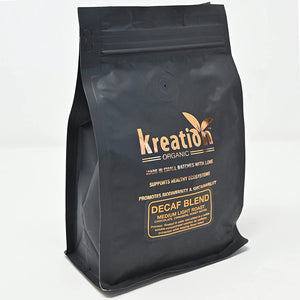 
                  
                    KREATION COFFEE, DECAF Blend Medium LIGHT Roast Organic Whole Bean Coffee, 11 Ounce Bag with Notes of Chocolate, Cinnamon, Honey
                  
                